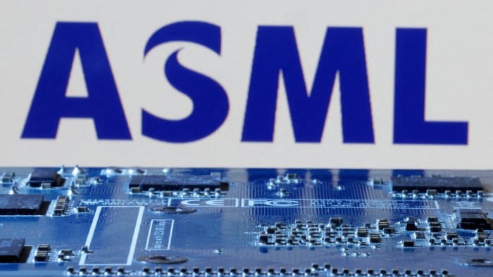 An ASML logo is seen near computer motherboard