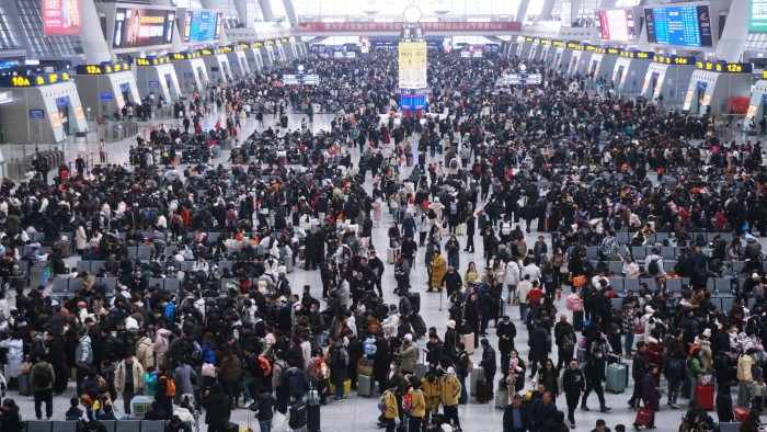 Overhead view of a crowded railway station in in Hangzhou, China