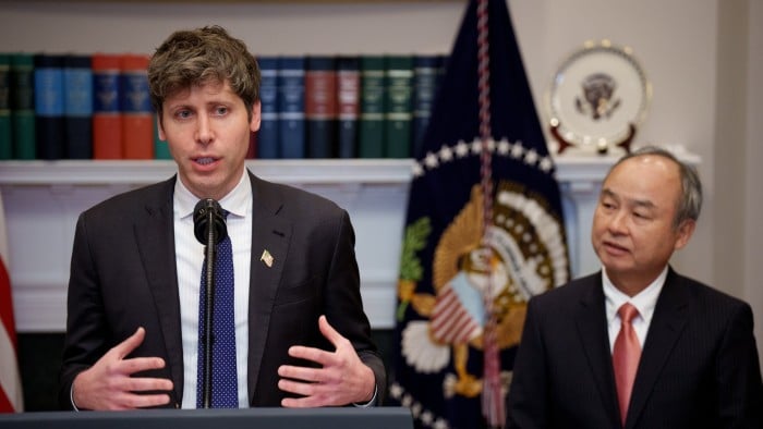 OpenAI CEO Sam Altman, left, accompanied by SoftBank CEO Masayoshi Son, speaks during a news conference in the Roosevelt Room of the White House on January 21 2025 in Washington, DC