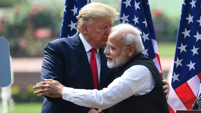 US President Donald Trump embraces India’s Prime Minister Narendra Modi in New Delhi in 2020