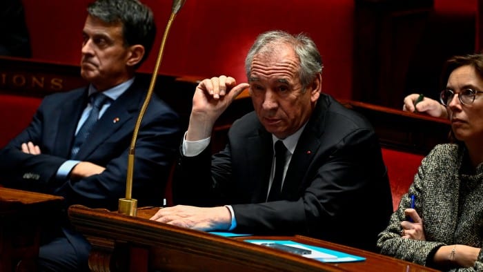 French Prime Minister François Bayrou, centre, flanked by minister of overseas Manuel Valls, left, and minister in charge of public accounts Amélie de Montchalin at the National Assembly in Paris on February 5 2025