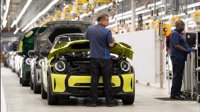 BMW Minis on the production line at the company’s plant in Cowley, Oxford