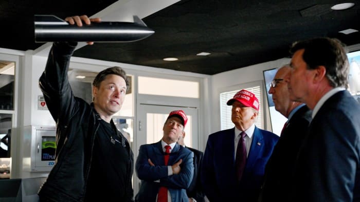 Elon Musk gives a tour to Donald Trump and others before a SpaceX rocket launch last year