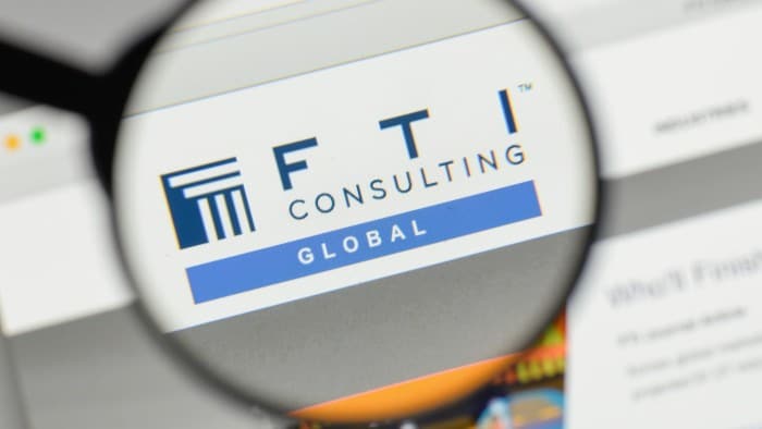 FTI Consulting website under a magnifying glass