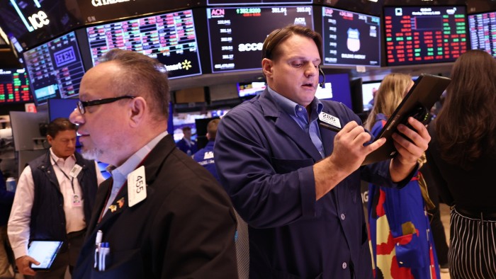 Traders working on the floor of the New York Stock Exchange on Monday