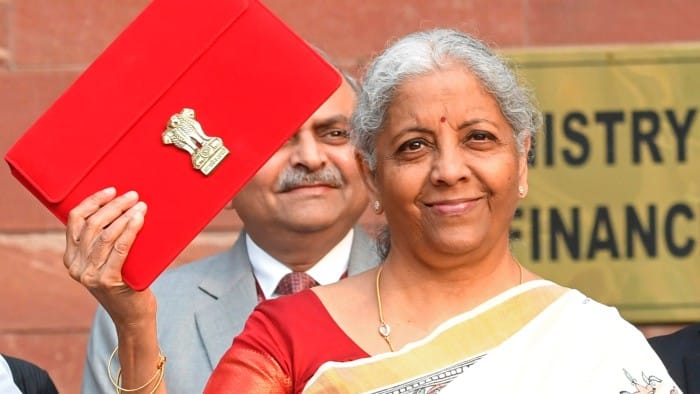 Nirmala Sitharaman holds a red puch contiaining budget documents up