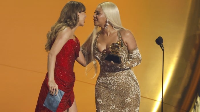 Taylor Swift, left, and Beyoncé on stage at the Grammy’s earlier this month