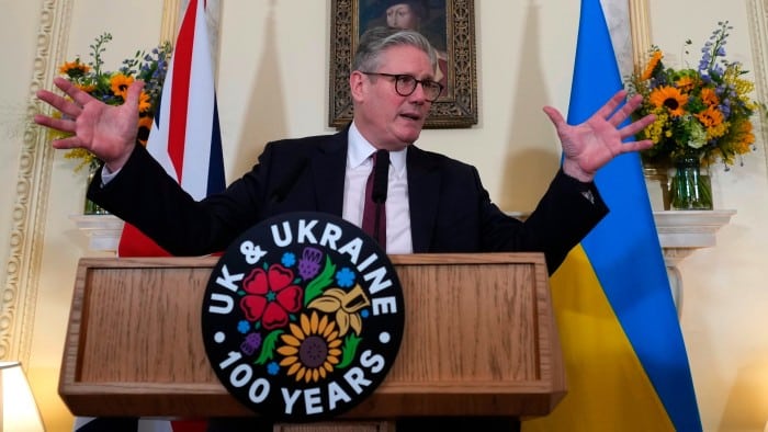 Sir Keir Starmer estures as he speaks to guests during a reception on the third anniversary of Russia’s invasion of Ukraine in London