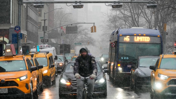 Cars and cyclists in New York City