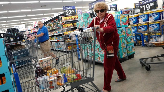 Customers shop in a Walmart Supercenter