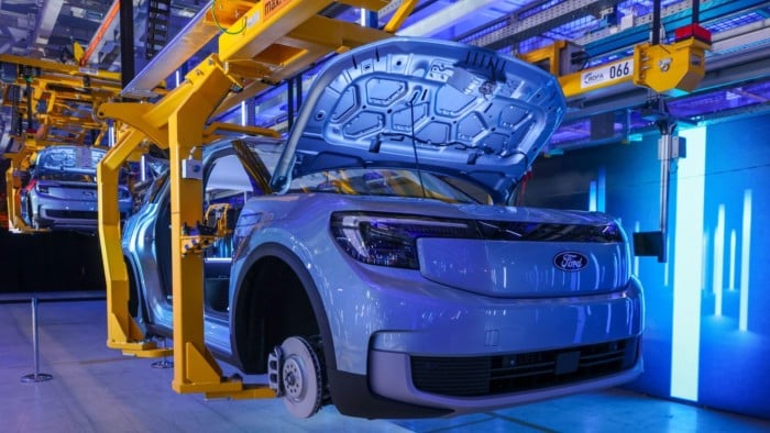 A fully electric Explorer SUV on an assembly line at the Ford plant in Cologne, Germany