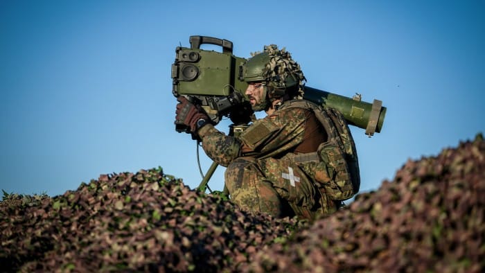 The soldier looks through the sights of an anti-tank weapon