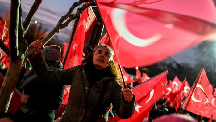 Supporters of Istanbul metropolitan Mayor Ekrem Imamoglu take part in a demonstration outside Istanbul municipality