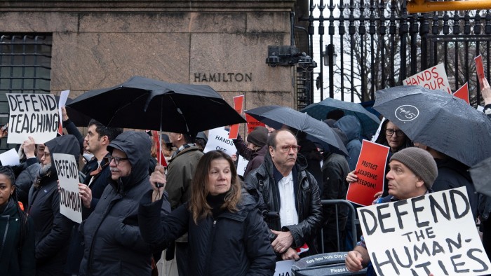 Columbia and Barnard faculty speak to media outside Columbia University in New York City on Tuesday