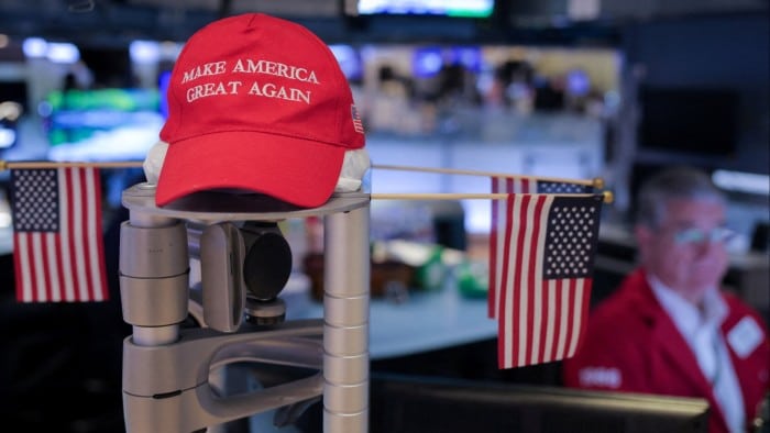 A ‘Make America Great Again’ hat is seen on display on the trading floor at the New York Stock Exchange, on September 18 2024