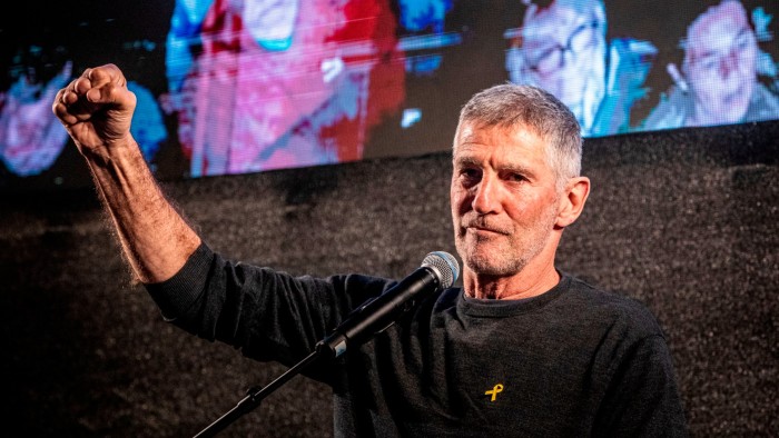 Yair Golan raises a clenched right fist