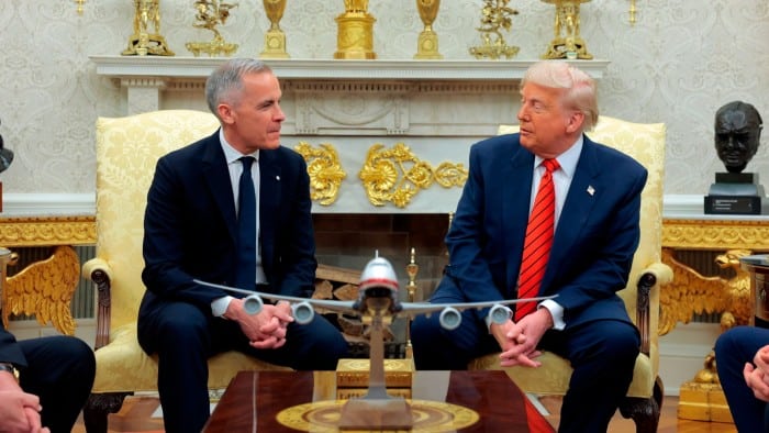 US President Donald Trump, right, meets with Canadian Prime Minister Mark Carney in the Oval Office at the White House on May 6 2025 in Washington