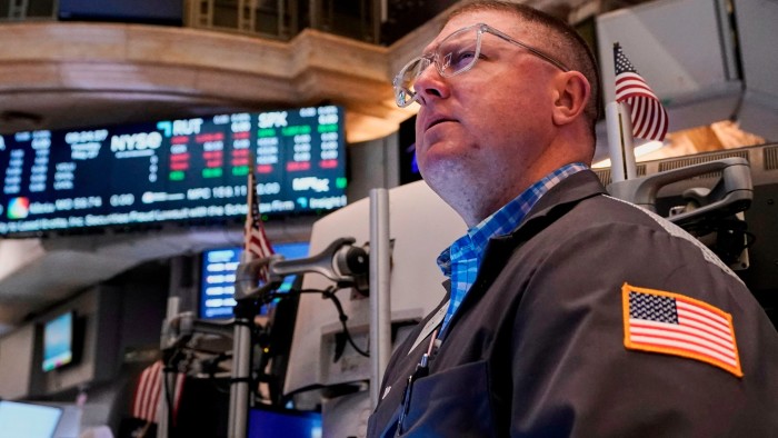 A trader on the floor of the New York Stock Exchange
