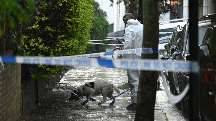 Police forensics teams investigate the fire at Starmer’s rented London home