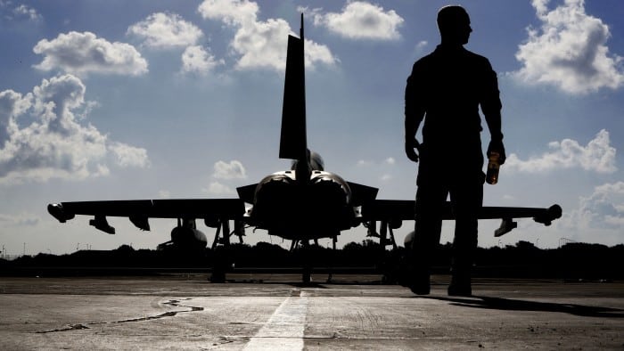 A British soldier and a Eurofighter Typhoon fighter jet at Royal Air Force’s Akrotiri base in Cyprus,