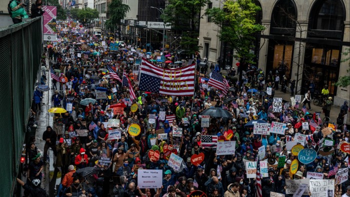 Thousands of New Yorkers march in opposition to Trump’s presidency on Saturday
