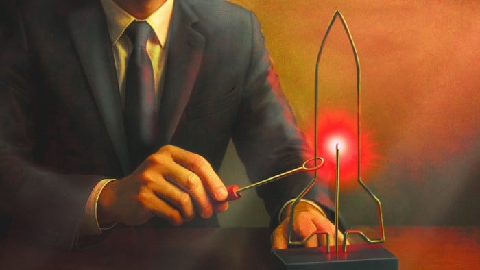 Illustration of a man playing a ‘buzz wire’ game with the electrically-charged wire shaped as a rocket
