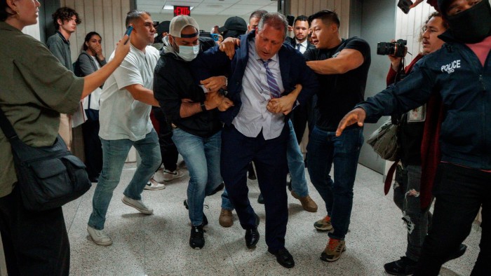 New York City comptroller Brad Lander is placed under arrest by Immigration and Customs Enforcement and FBI agents outside federal immigration court