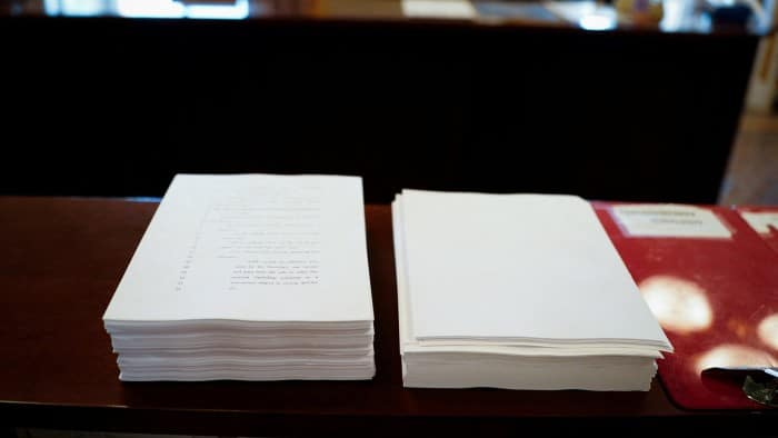 A copy of US President Donald Trump’s 940-page tax and spending bill is seen on a desk in the Senate chamber on Capitol Hill in Washington, DC