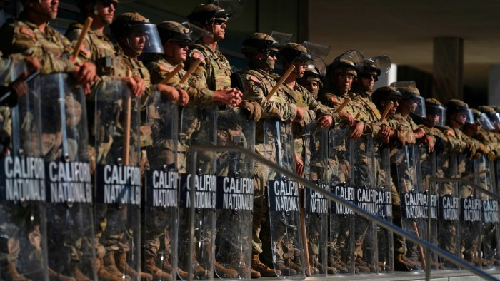 California National Guard are positioned at the Federal Building on Tuesday, June 10, 2025, in downtown Los Angeles.