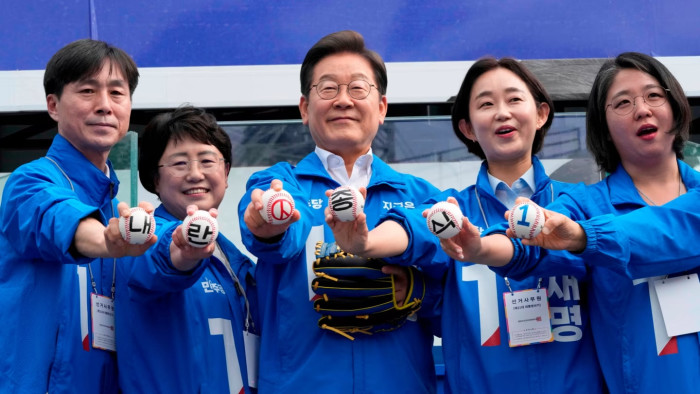 Lee Jae-myung, South Korea’s Democratic party’s presidential candidate, centre, with party members at a sports complex in Seoul