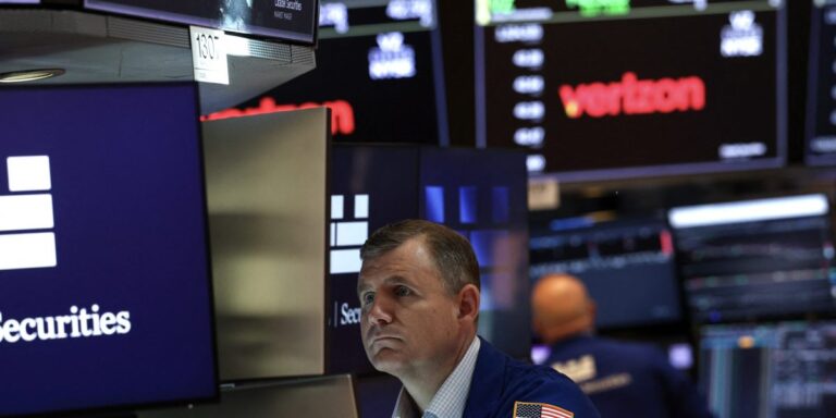 Stock market closes out chaotic quarter on a high note as S&P 500 notches another new record
