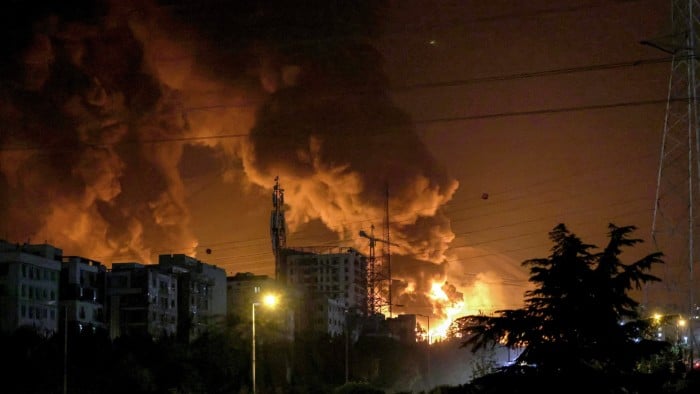 A fire blazes in the oil depots of Shahran, northwest of Tehran