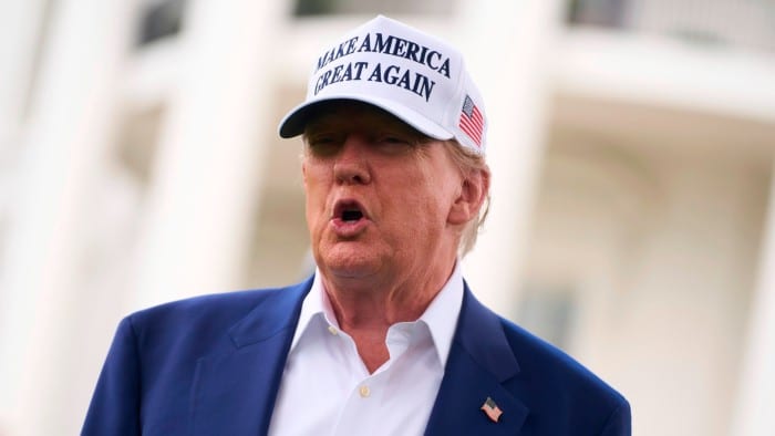 Donald Trump speaks to reporters on Wednesday