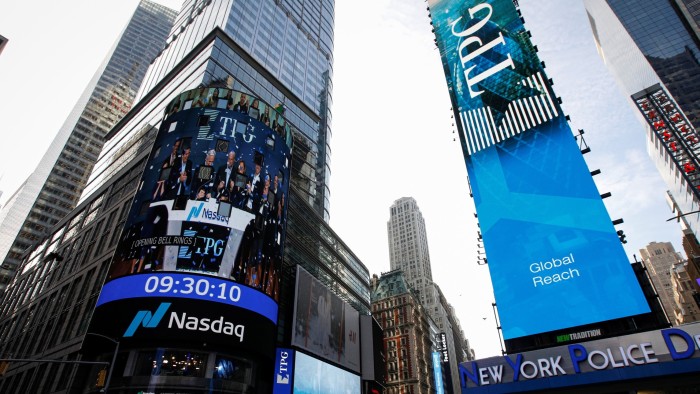 A screen announces the listing of private-equity firm TPG, during the IPO at the Nasdaq Market site in Times Square in New York City in January 2022