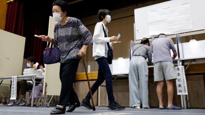 Voters at a Tokyo polling station