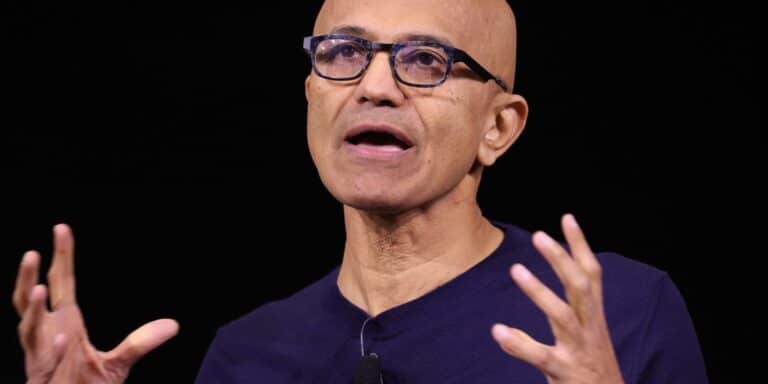 Satya Nadella on the 'enigma of success' in the age of AI: a thriving business, but 15,000+ layoffs