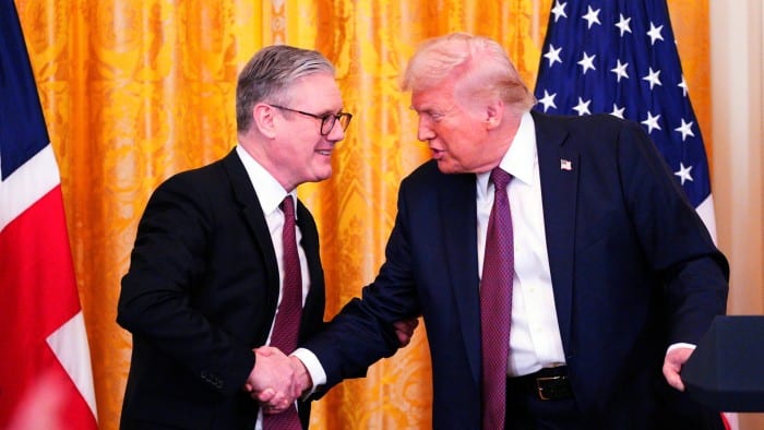 Donald Trump shakes hands with Keir Starmer