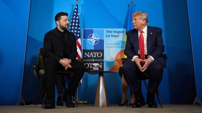 US President Donald Trump and Ukrainian leader Volodymyr Zelenskyy attend a meeting at the Nato summit in The Hague