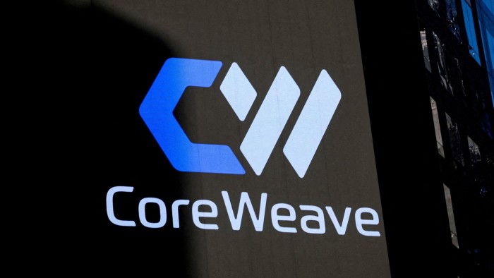 CoreWeave logo displayed on a screen during the company's IPO at the Nasdaq Market.
