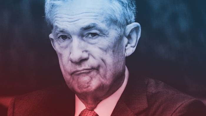 Jay Powell looking serious, with a blue and red colour overlay on the image.
